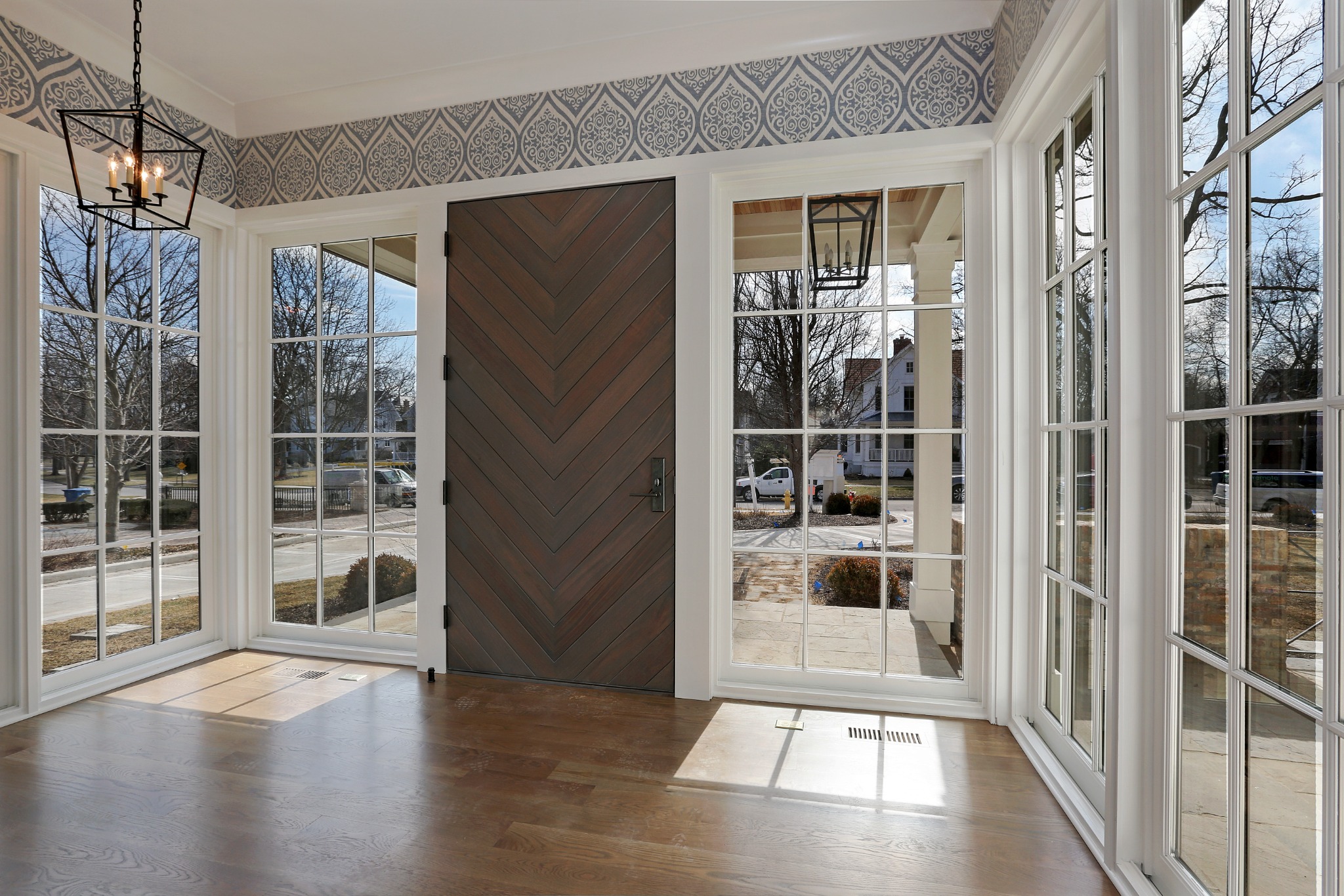 Light-filled custom entry with detailed millwork