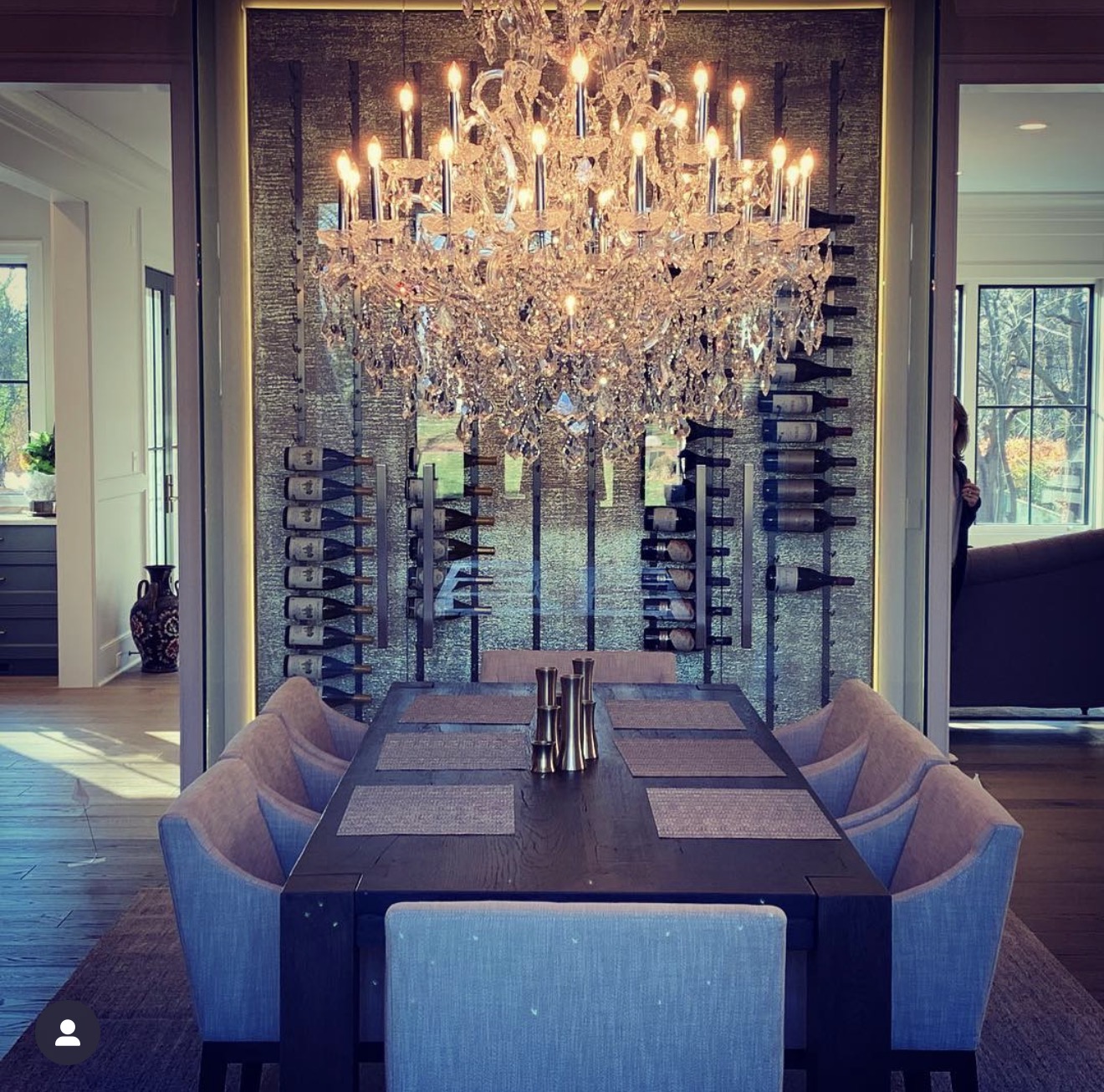 Custom wine room with sculptural lighting